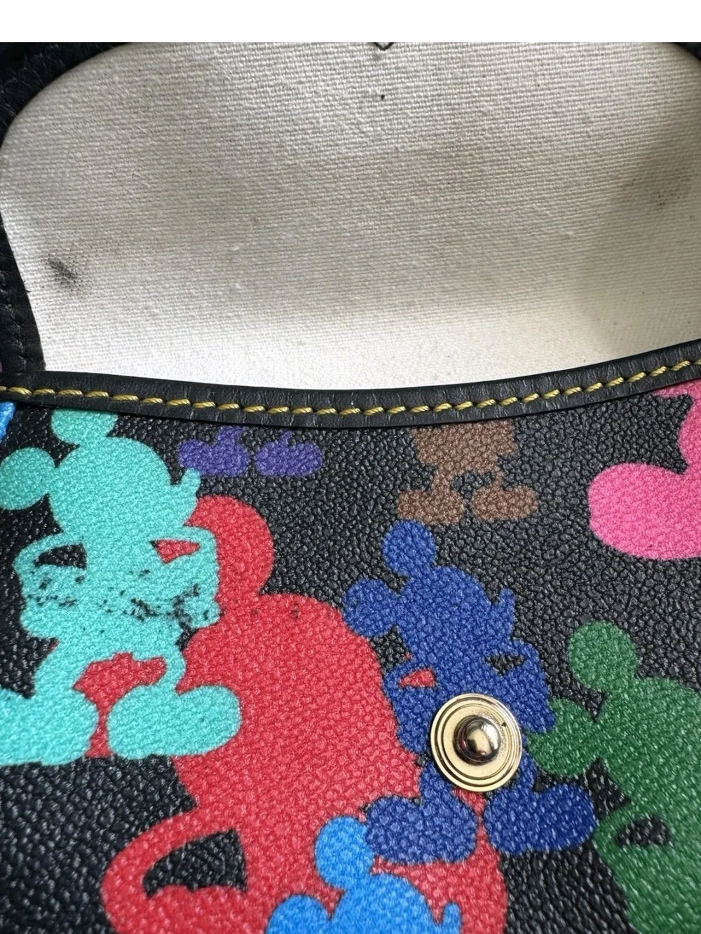Dooney & Bourke Black Wristlet Pouch with Multicolor Character Print